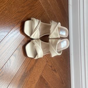 These dolce vita shoes are like new.  Gorgeous cream color